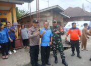 Bhabinkamtibmas Polsek Siantar Marihat Dampingi Penyaluran Bansos untuk Korban Kebakaran