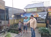 Bhabinkamtibmas Polsek Siantar Marihat Gerak Cepat Tanggapi Banjir di Simarimbun