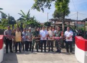 Bhabinkamtibmas Polsek Siantar Marihat Hadiri Peresmian Jembatan Garuda Merah Putih